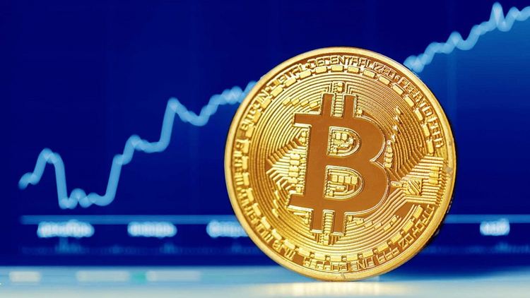 Биткоин с нов рекорд - над 24 000 долара